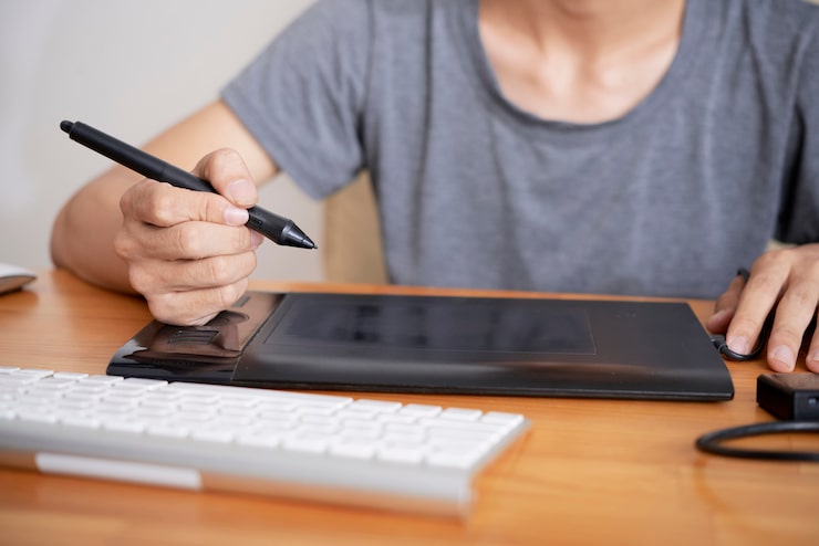 Designer working on digital tablet
