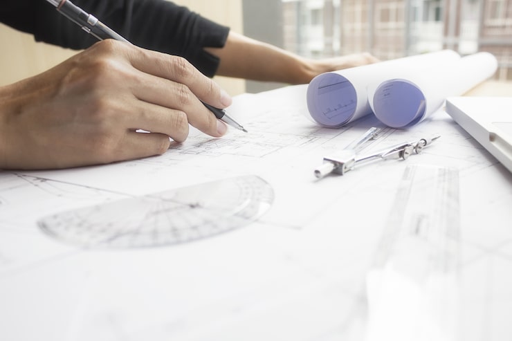 Engineer drafting custom sports equipment