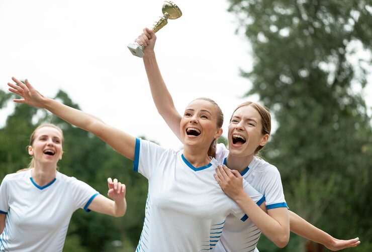 Athletes celebrating championship match victory